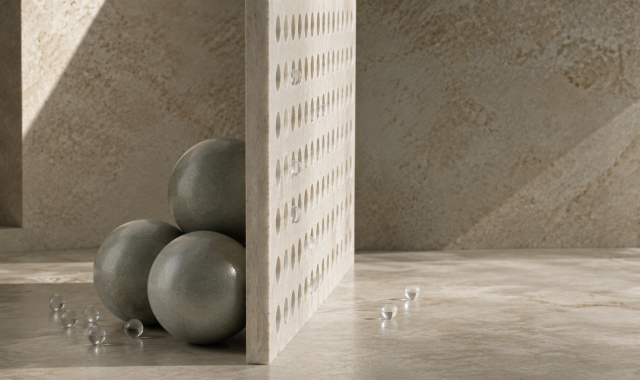 Perforated wall allowing small particles to pass while blocking larger spheres, illustrating selective intestinal permeability.